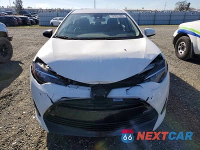 Piąte zdjęcie samochodu w środku: 2019 TOYOTA COROLLA L VIN:5YFBURHE4KP879058 - miniatura