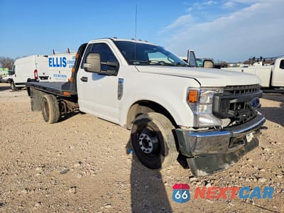 Czwarte zdjęcie samochodu z boku: 2022 FORD F350 SUPER DUTY FLATBED TRUCK VIN:1FDRF3G60NEE17240 - miniatura
