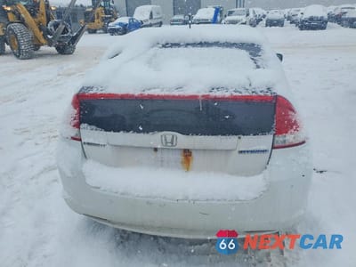 Zdjęcie 6 z 11 samochodu: 2010 HONDA INSIGHT EX VIN:JHMZE2H75AS036793 - miniatura