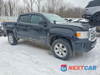 Czwarte zdjęcie samochodu z boku: 2015 GMC CANYON SLE VIN:1GTG6BE33F1233191 - miniatura