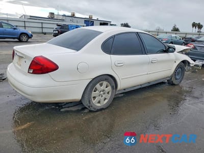 Trzecie zdjęcie samochodu z tyłu: 2000 FORD TAURUS LX VIN:1FAFP5221YA243068 - miniatura