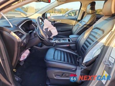 Zdjęcie 7 z 12 samochodu: 2021 FORD EDGE SEL VIN:2FMPK3J92MBA11511 - miniatura