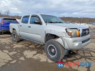 Czwarte zdjęcie samochodu z boku: 2011 TOYOTA TACOMA V6 VIN:3TMLU4EN1BM060902 - miniatura