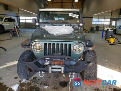 Piąte zdjęcie samochodu w środku: 2000 JEEP WRANGLER / TJ SPORT VIN:1J4FA49S2YP710100 - miniatura