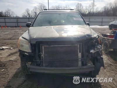 Piąte zdjęcie samochodu w środku: 2006 HONDA PILOT EX VIN:2HKYF18556H534078 - miniatura