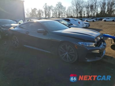 Czwarte zdjęcie samochodu z boku: 2019 BMW M850XI VIN:WBABC4C53KBU95927 - miniatura