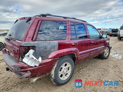 Trzecie zdjęcie samochodu z tyłu: 2001 JEEP GRAND CHEROKEE LIMITED VIN:1J4GW58NX1C739980 - miniatura