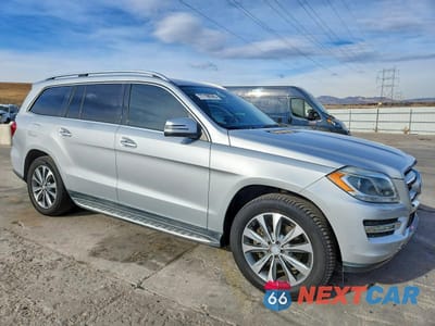 Czwarte zdjęcie samochodu z boku: 2016 MERCEDES-BENZ GL 450 4MATIC VIN:4JGDF6EE7GA668210 - miniatura