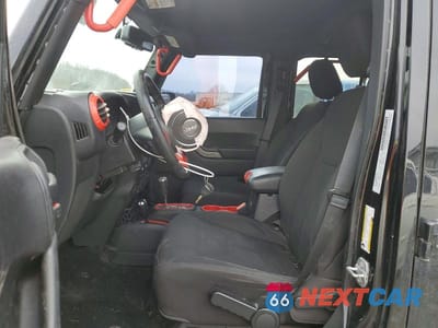 Zdjęcie 7 z 11 samochodu: 2015 JEEP WRANGLER UNLIMITED SPORT VIN:1C4BJWDG5FL735533 - miniatura