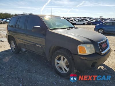 Czwarte zdjęcie samochodu z boku: 2004 GMC ENVOY VIN:1GKDT13SX42331260 - miniatura