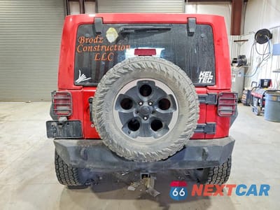 Zdjęcie 6 z 13 samochodu: 2014 JEEP WRANGLER UNLIMITED SAHARA VIN:1C4HJWEG1EL324346 - miniatura