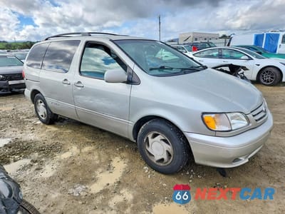 Czwarte zdjęcie samochodu z boku: 2003 TOYOTA SIENNA VIN:4T3ZF13CX3U545558 - miniatura