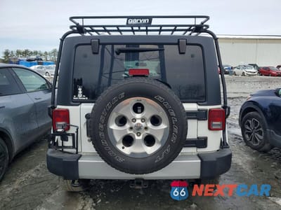 Zdjęcie 6 z 12 samochodu: 2015 JEEP WRANGLER UNLIMITED SAHARA VIN:1C4BJWEGXFL742668 - miniatura