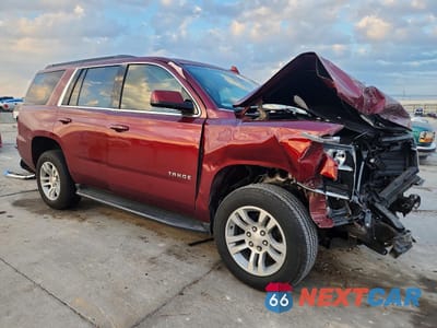 Czwarte zdjęcie samochodu z boku: 2020 CHEVROLET TAHOE C1500 LT VIN:1GNSCBKC9LR189029 - miniatura