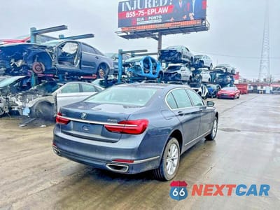 Czwarte zdjęcie samochodu z boku: 2018 BMW 740 XI VIN:WBA7E4C54JGV23896 - miniatura