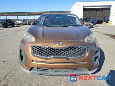 Piąte zdjęcie samochodu w środku: 2017 KIA SPORTAGE LX VIN:KNDPM3AC1H7160758 - miniatura