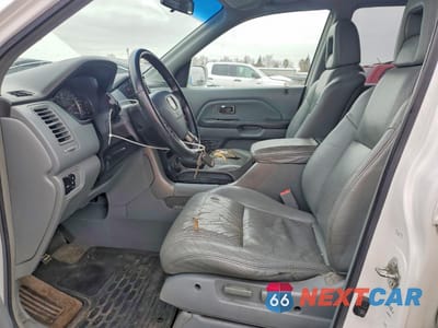 Zdjęcie 7 z 13 samochodu: 2004 HONDA PILOT EXL VIN:2HKYF18774H594183 - miniatura