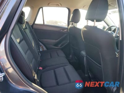 Zdjęcie 10 z 12 samochodu: 2014 MAZDA CX-5 TOURING VIN:JM3KE2CY2E0319924 - miniatura