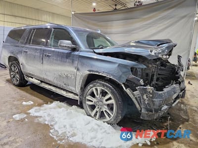 Czwarte zdjęcie samochodu z boku: 2019 CHEVROLET SUBURBAN K1500 LT VIN:1GNSKHKC2KR360806 - miniatura
