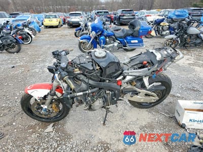 Trzecie zdjęcie samochodu z tyłu: 2003 HONDA CBR600 RR VIN:JH2PC37063M004720 - miniatura