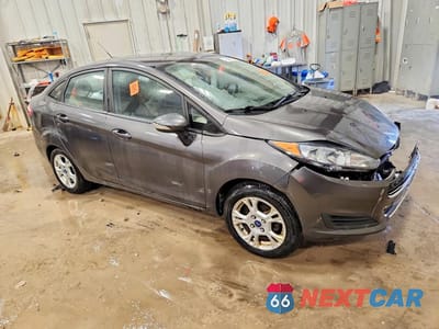Czwarte zdjęcie samochodu z boku: 2015 FORD FIESTA SE VIN:3FADP4BJ6FM145176 - miniatura