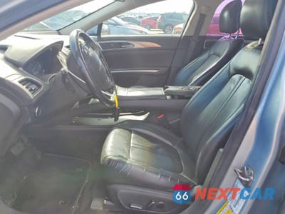 Zdjęcie 7 z 12 samochodu: 2013 LINCOLN MKZ HYBRID VIN:3LN6L2LU7DR804227 - miniatura