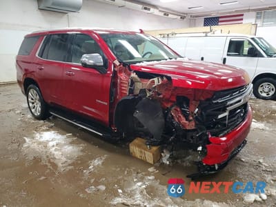 Czwarte zdjęcie samochodu z boku: 2023 CHEVROLET TAHOE K1500 PREMIER VIN:1GNSKSKT2PR554594 - miniatura