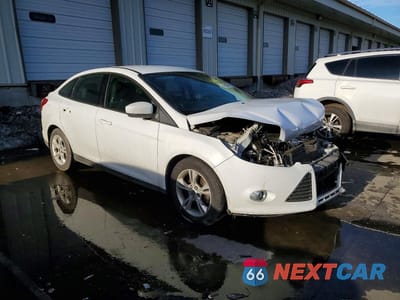 Czwarte zdjęcie samochodu z boku: 2012 FORD FOCUS SE VIN:1FAHP3F21CL141368 - miniatura