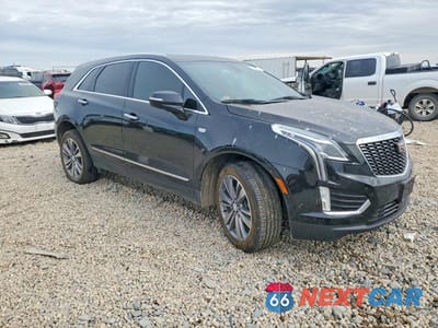 Czwarte zdjęcie samochodu z boku: 2022 CADILLAC XT5 PREMIUM LUXURY VIN:1GYKNDRS3NZ103173 - miniatura