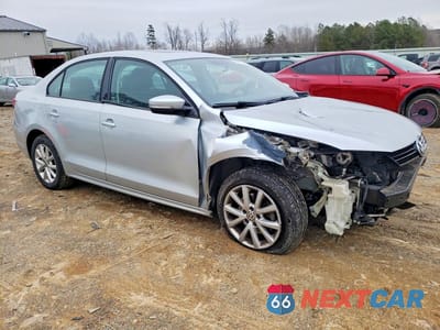 Czwarte zdjęcie samochodu z boku: 2012 VOLKSWAGEN JETTA SE VIN:3VWBP7AJ0CM339456 - miniatura