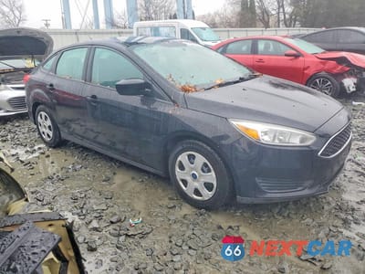 Czwarte zdjęcie samochodu z boku: 2016 FORD FOCUS S VIN:1FADP3E29GL270898 - miniatura