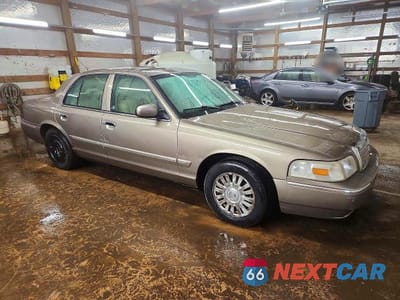 Czwarte zdjęcie samochodu z boku: 2006 MERCURY GRAND MARQUIS LS VIN:2MEFM75W26X644953 - miniatura
