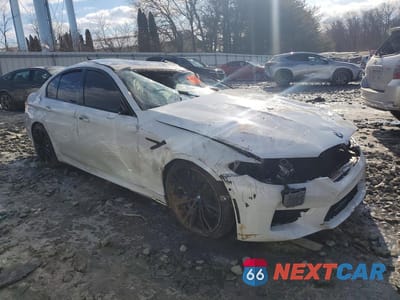 Czwarte zdjęcie samochodu z boku: 2019 BMW M5 VIN:WBSJF0C53KB285058 - miniatura