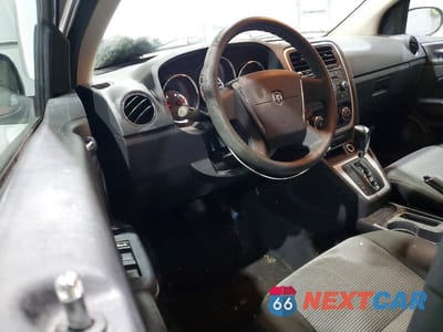 Zdjęcie 8 z 12 samochodu: 2011 DODGE CALIBER MAINSTREET VIN:1B3CB3HA8BD148111 - miniatura