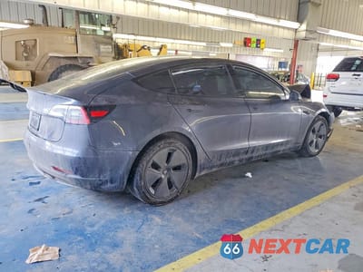 Trzecie zdjęcie samochodu z tyłu: 2023 TESLA MODEL 3 VIN:5YJ3E1EA2PF640714 - miniatura