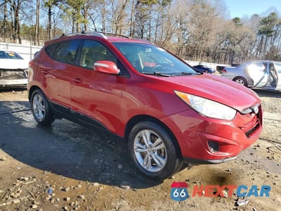Czwarte zdjęcie samochodu z boku: 2012 HYUNDAI TUCSON GLS VIN:KM8JU3AC8CU337902 - miniatura