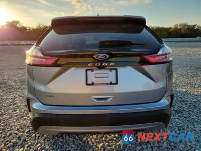 Zdjęcie 6 z 12 samochodu: 2021 FORD EDGE SEL VIN:2FMPK3J92MBA11511 - miniatura