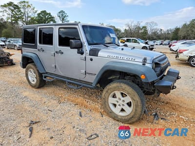 Czwarte zdjęcie samochodu z boku: 2016 JEEP WRANGLER UNLIMITED RUBICON VIN:1C4BJWFG6GL128281 - miniatura