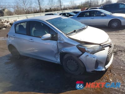 Czwarte zdjęcie samochodu z boku: 2017 TOYOTA YARIS 5-DOOR L VIN:VNKKTUD32HA078045 - miniatura