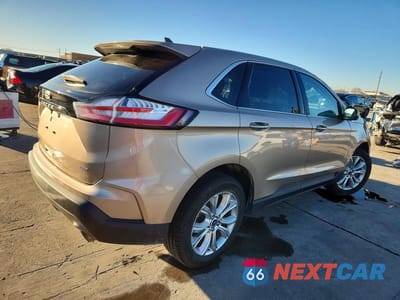 Trzecie zdjęcie samochodu z tyłu: 2021 FORD EDGE TITANIUM VIN:2FMPK4K96MBA27182 - miniatura