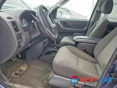 Zdjęcie 7 z 14 samochodu: 2003 FORD ESCAPE XLT VIN:1FMYU03143KD48352 - miniatura