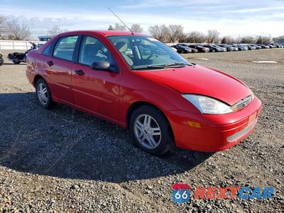 Czwarte zdjęcie samochodu z boku: 2000 FORD FOCUS SE VIN:1FAFP34P3YW214753 - miniatura