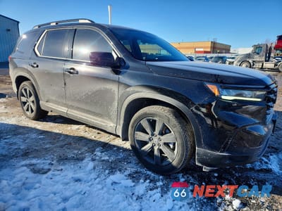 Czwarte zdjęcie samochodu z boku: 2024 HONDA PILOT ELITE VIN:5FNYG1H86RB500306 - miniatura