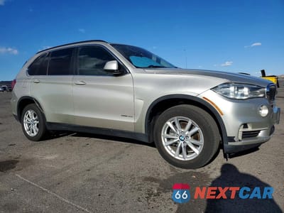 Czwarte zdjęcie samochodu z boku: 2014 BMW X5 SDRIVE35I VIN:5UXKR2C50E0H33935 - miniatura