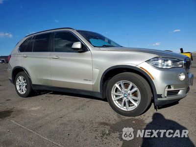 Czwarte zdjęcie samochodu z boku: 2014 BMW X5 SDRIVE35I VIN:5UXKR2C50E0H33935 - miniatura