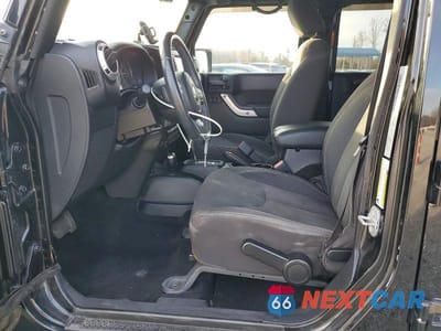 Zdjęcie 7 z 12 samochodu: 2015 JEEP WRANGLER UNLIMITED SAHARA VIN:1C4BJWEG5FL734770 - miniatura