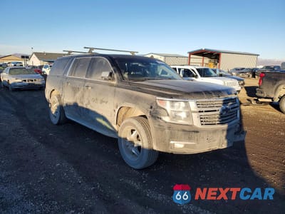 Czwarte zdjęcie samochodu z boku: 2015 CHEVROLET SUBURBAN K1500 LTZ VIN:1GNSKKKC1FR145422 - miniatura