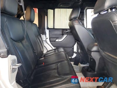 Zdjęcie 10 z 13 samochodu: 2013 JEEP WRANGLER UNLIMITED SAHARA VIN:1C4BJWEG1DL613053 - miniatura