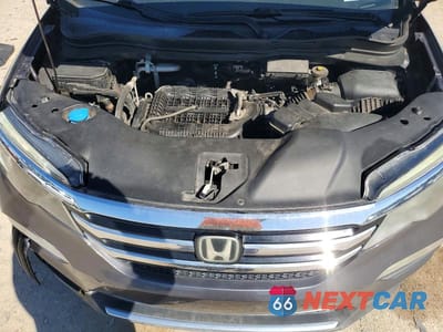 Zdjęcie 12 z 12 samochodu: 2016 HONDA PILOT ELITE VIN:5FNYF6H04GB059024 - miniatura