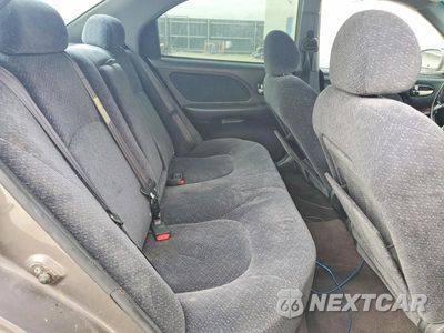 Zdjęcie 10 z 11 samochodu: 2002 HYUNDAI SONATA BASE VIN:KMHWF25HX2A719980 - miniatura